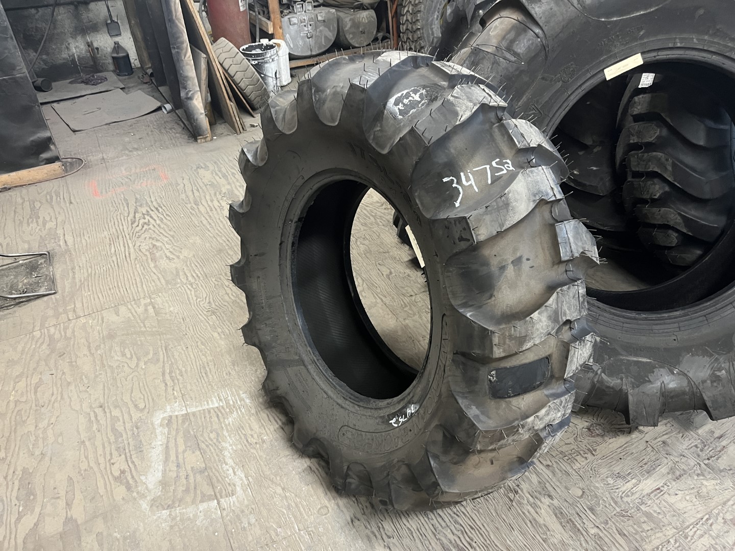 <font color='#da2127' font size ='2'><b>17.5L24 American OTR Tire R-4 Backhoe 8-Ply </font></b><br><font size ='1' color='grey'>CONDITION: </font><font size ='2'>New<br><font size ='1' color='grey'>TREAD DEPTH:</font><font size ='2'> 26/32nds<br><font size ='1' color='grey'>DETAILS:</font><font size ='2'> Unused<br><font size ='1' color='grey'>REF #:</font><font size ='2'> G34752<br><font size ='1' color='grey'>LOCATION:</font><font size ='2'> St. Louis, MO