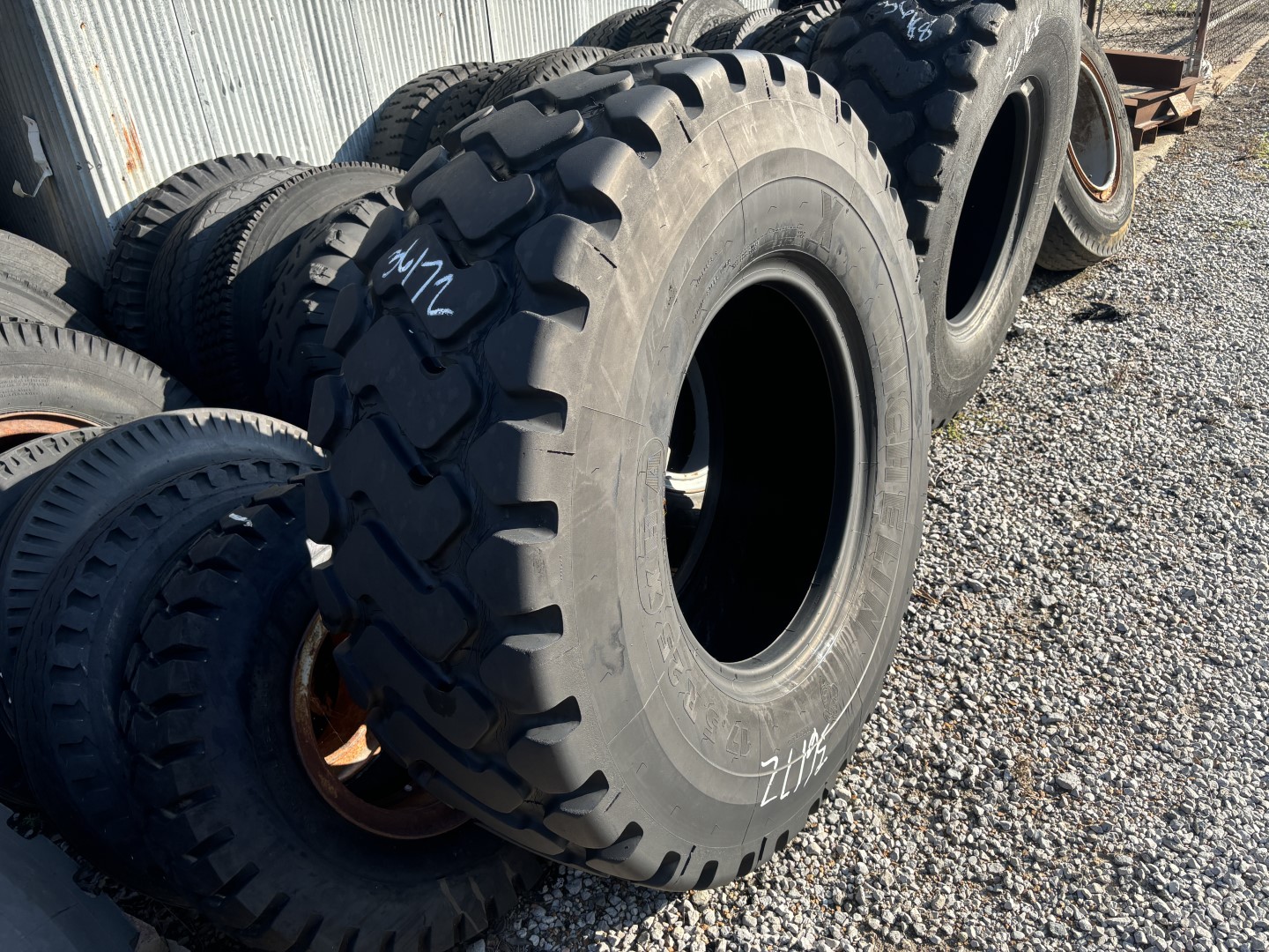 <font color='#da2127' font size ='2'><b>17.5R25 Michelin OTR Tire E-3 L-3 XHA 1-Star </font></b><br><font size ='1' color='grey'>CONDITION: </font><font size ='2'>Used<br><font size ='1' color='grey'>TREAD DEPTH:</font><font size ='2'> 26/32nds<br><font size ='1' color='grey'>DETAILS:</font><font size ='2'> Clean, Weathered Tread<br><font size ='1' color='grey'>REF #:</font><font size ='2'> G36172<br><font size ='1' color='grey'>LOCATION:</font><font size ='2'> St. Louis, MO