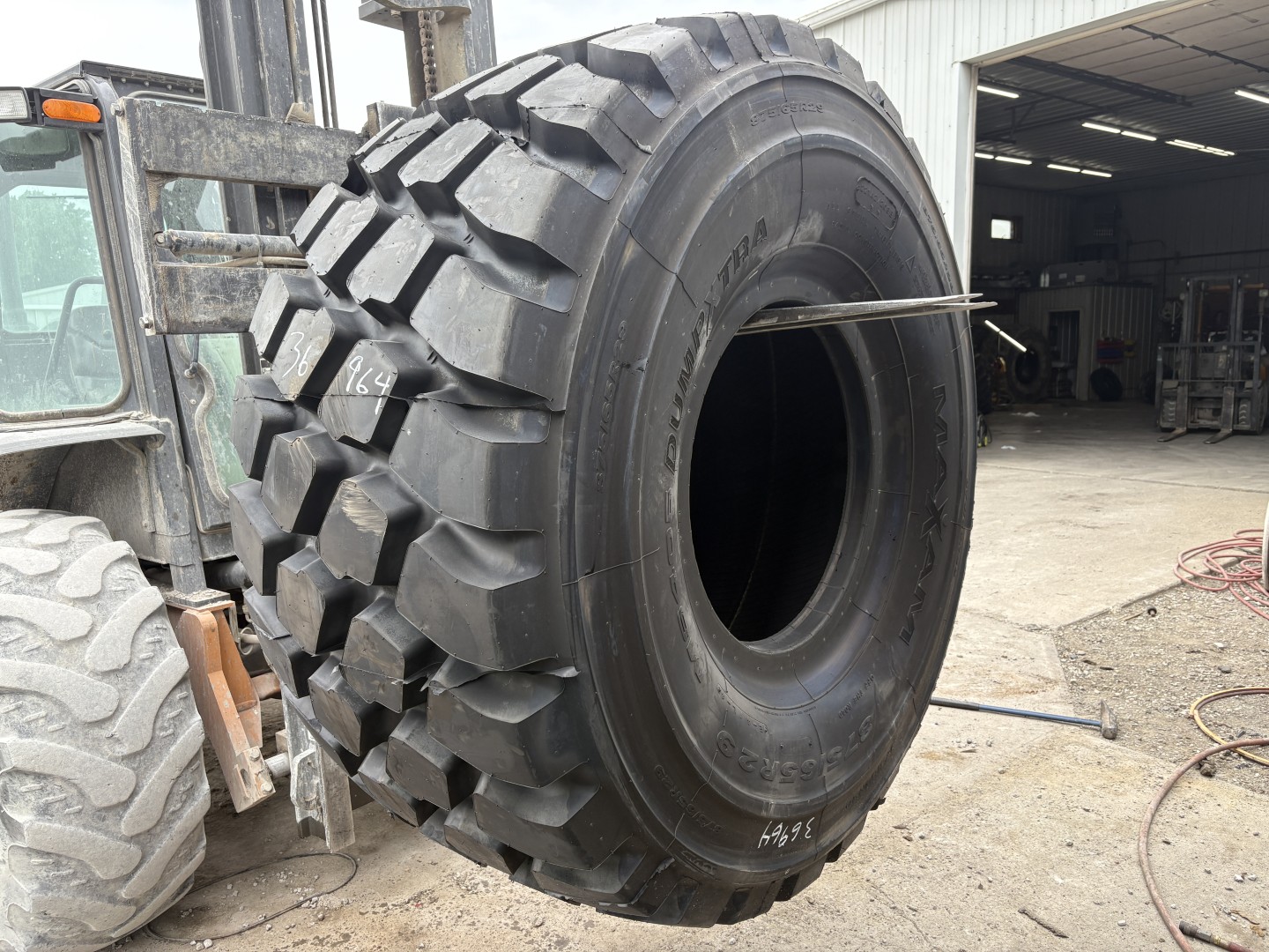 <font color='#da2127' font size ='2'><b>875/65R29 Maxam OTR Tire E-4 L-4 MS405 2-Star </font></b><br><font size ='1' color='grey'>CONDITION: </font><font size ='2'>New<br><font size ='1' color='grey'>TREAD DEPTH:</font><font size ='2'> 75/32nds<br><font size ='1' color='grey'>DETAILS:</font><font size ='2'> Unused<br><font size ='1' color='grey'>REF #:</font><font size ='2'> G36964<br><font size ='1' color='grey'>LOCATION:</font><font size ='2'> St. Louis, MO
