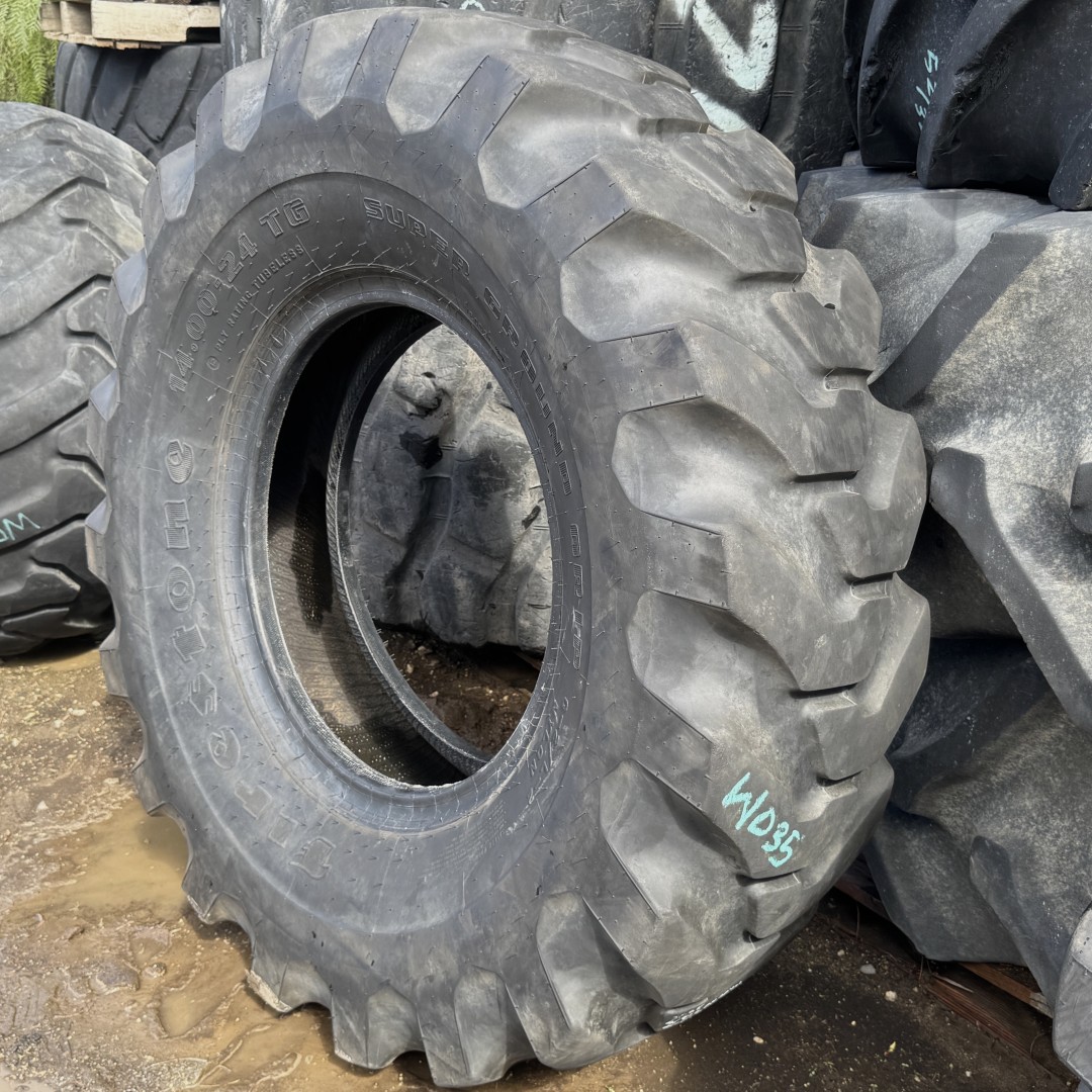 <font color='#da2127' font size ='2'><b>14.00X24 Firestone OTR Tire E-2 L-2 G-2 SGG Super Ground Grip 12-Ply </font></b><br><font size ='1' color='grey'>CONDITION: </font><font size ='2'>Used<br><font size ='1' color='grey'>TREAD DEPTH:</font><font size ='2'> 23/32nds<br><font size ='1' color='grey'>DETAILS:</font><font size ='2'> Clean<br><font size ='1' color='grey'>REF #:</font><font size ='2'> W035<br><font size ='1' color='grey'>LOCATION:</font><font size ='2'> San Jacinto, CA