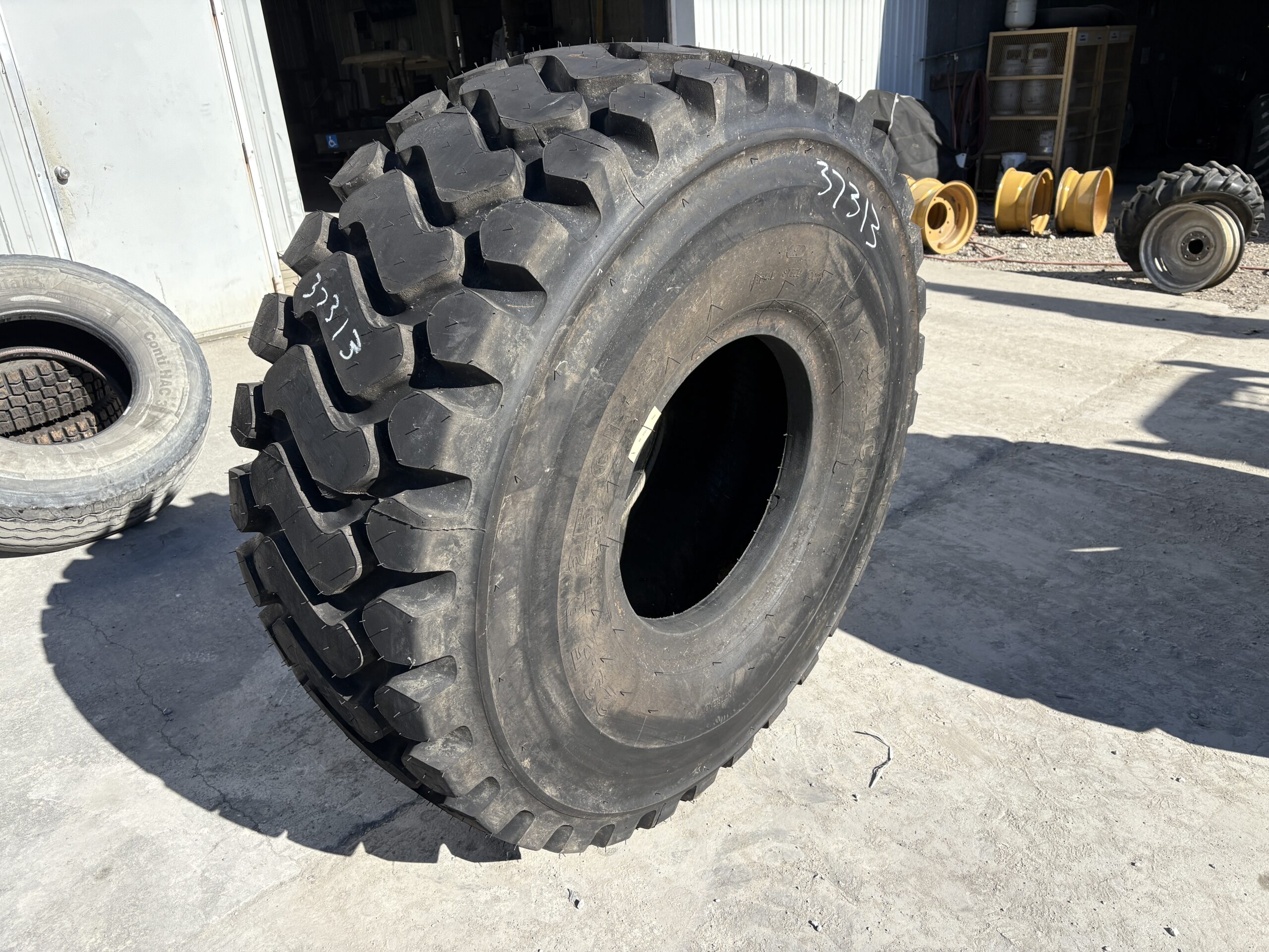 <font color='#da2127' font size ='2'><b>23.5R25 Unicure OTR Tire L-3 CL3 1-Star </font></b><br><font size ='1' color='grey'>CONDITION: </font><font size ='2'>Retread-New<br><font size ='1' color='grey'>TREAD DEPTH:</font><font size ='2'> 46/32nds<br><font size ='1' color='grey'>DETAILS:</font><font size ='2'> New Recap Older Tire <br><font size ='1' color='grey'>REF #:</font><font size ='2'> G37313<br><font size ='1' color='grey'>LOCATION:</font><font size ='2'> St. Louis, MO