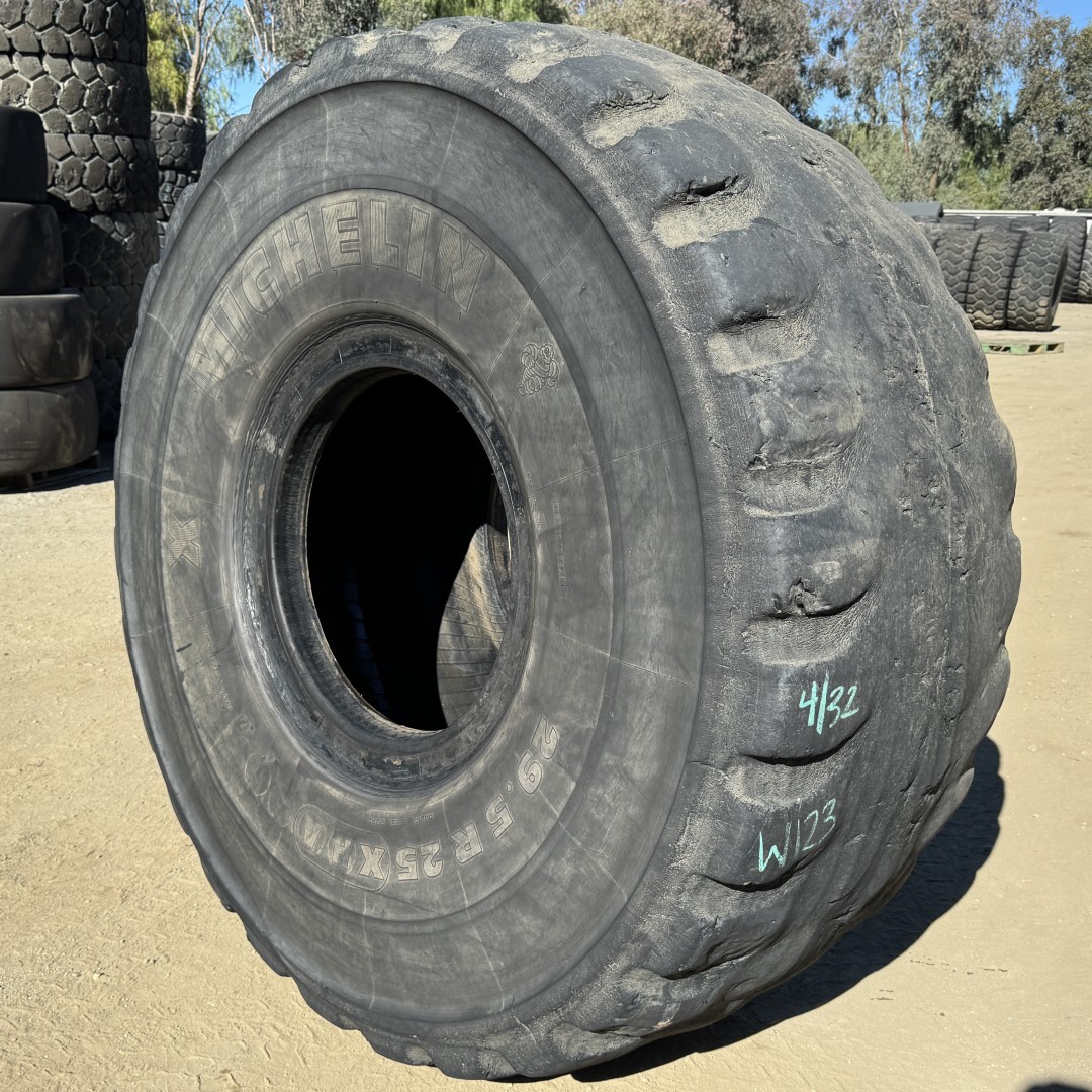 <font color='#da2127' font size ='2'><b>29.5R25 Michelin OTR Tire E-3 L-3 XHA 1-Star </font></b><br><font size ='1' color='grey'>CONDITION: </font><font size ='2'>Used<br><font size ='1' color='grey'>TREAD DEPTH:</font><font size ='2'> 4/32nds<br><font size ='1' color='grey'>DETAILS:</font><font size ='2'> Rough Tread, Shoulder Cracks, 1-Shoulder Patch, "As-Is"<br><font size ='1' color='grey'>REF #:</font><font size ='2'> W123<br><font size ='1' color='grey'>LOCATION:</font><font size ='2'> San Jacinto, CA