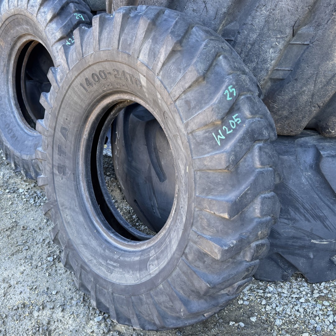<font color='#da2127' font size ='2'><b>14.00X24 Specialty Tires of America OTR Tire E-2 L-2 G-2 R-4 American Contractor 16-Ply </font></b><br><font size ='1' color='grey'>CONDITION: </font><font size ='2'>Used<br><font size ='1' color='grey'>TREAD DEPTH:</font><font size ='2'> 25/32nds<br><font size ='1' color='grey'>DETAILS:</font><font size ='2'> Clean, 1-Nail Patch<br><font size ='1' color='grey'>REF #:</font><font size ='2'> W205<br><font size ='1' color='grey'>LOCATION:</font><font size ='2'> San Jacinto, CA