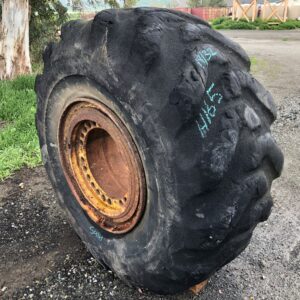 <font color='#da2127' font size ='2'><b>26.5X25 Firestone OTR Tire E-2 L-2 SGG LD Super Ground Grip  20-Ply </font></b><br><font size ='1' color='grey'>CONDITION: </font><font size ='2'>Used<br><font size ='1' color='grey'>TREAD DEPTH:</font><font size ='2'>  19/32nds<br><font size ='1' color='grey'>DETAILS:</font><font size ='2'> On Rim, Old and Weathered, Sidewall Damage<br><font size ='1' color='grey'>REF #:</font><font size ='2'> H165<br><font size ='1' color='grey'>LOCATION:</font><font size ='2'> Amarillo, TX