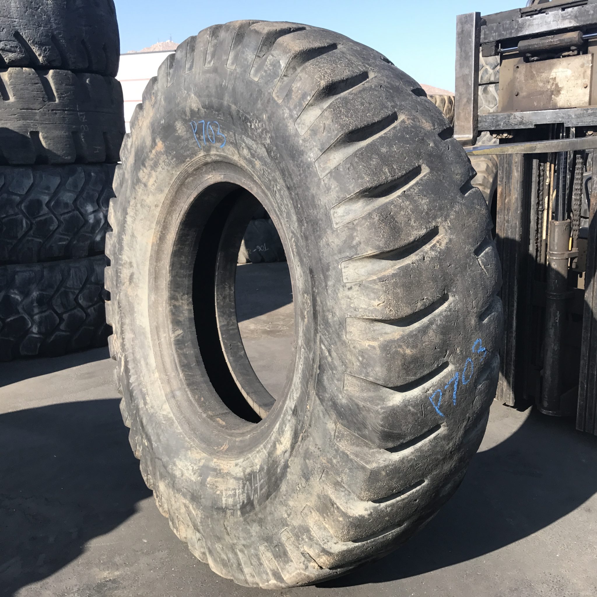 <font color='#da2127' font size ='2'><b>21.00X35 General OTR Tire E-4 ND Super LCM 36-Ply </font></b><br><font size ='1' color='grey'>CONDITION: </font><font size ='2'>Used<br><font size ='1' color='grey'>TREAD DEPTH:</font><font size ='2'> 25/32nds<br><font size ='1' color='grey'>DETAILS:</font><font size ='2'> Clean<br><font size ='1' color='grey'>REF #:</font><font size ='2'> P703<br><font size ='1' color='grey'>LOCATION:</font><font size ='2'> Tucson, AZ