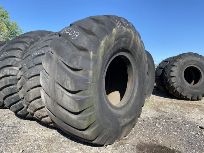 <font color='#da2127' font size ='2'><b>33.5X33 Firestone OTR Tire E-3 L-3 SRG Super Rock Grip 32-Ply </font></b><br><font size ='1' color='grey'>CONDITION: </font><font size ='2'>Retread-Used<br><font size ='1' color='grey'>TREAD DEPTH:</font><font size ='2'>  30/32nds<br><font size ='1' color='grey'>DETAILS:</font><font size ='2'> 1-Tread Section, Weathered<br><font size ='1' color='grey'>REF #:</font><font size ='2'> G18208<br><font size ='1' color='grey'>LOCATION:</font><font size ='2'> St. Louis, MO