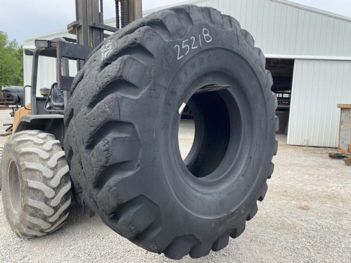 <font color='#da2127' font size ='2'><b>33.5X33 Firestone OTR Tire E-4 SRG DT Super Rock Grip Deep Tread 32-Ply </font></b><br><font size ='1' color='grey'>CONDITION: </font><font size ='2'>Used<br><font size ='1' color='grey'>TREAD DEPTH:</font><font size ='2'>  58/32nds<br><font size ='1' color='grey'>DETAILS:</font><font size ='2'> Clean, Old<br><font size ='1' color='grey'>REF #:</font><font size ='2'> G25218<br><font size ='1' color='grey'>LOCATION:</font><font size ='2'> St. Louis, MO