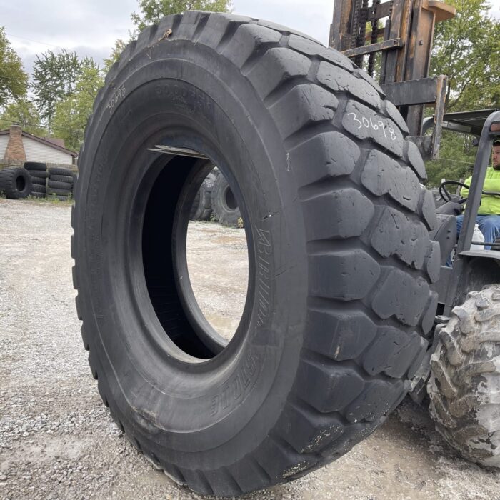 <font color='#da2127' font size ='2'><b>30.00R51 Bridgestone OTR Tire E-3 L-3 VMT 2-Star </font></b><br><font size ='1' color='grey'>CONDITION: </font><font size ='2'>Used<br><font size ='1' color='grey'>TREAD DEPTH:</font><font size ='2'>  28/32nds<br><font size ='1' color='grey'>DETAILS:</font><font size ='2'> Clean, Sidewall Spots<br><font size ='1' color='grey'>REF #:</font><font size ='2'> G30698<br><font size ='1' color='grey'>LOCATION:</font><font size ='2'> St. Louis, MO