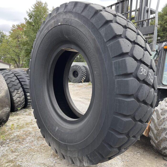 <font color='#da2127' font size ='2'><b>30.00R51 Bridgestone OTR Tire E-3 L-3 VMT 2-Star </font></b><br><font size ='1' color='grey'>CONDITION: </font><font size ='2'>Used<br><font size ='1' color='grey'>TREAD DEPTH:</font><font size ='2'>  42/32nds<br><font size ='1' color='grey'>DETAILS:</font><font size ='2'> Clean<br><font size ='1' color='grey'>REF #:</font><font size ='2'> G30712<br><font size ='1' color='grey'>LOCATION:</font><font size ='2'> St. Louis, MO