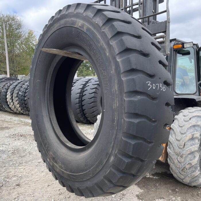 <font color='#da2127' font size ='2'><b>24.00R49 Bridgestone OTR Tire E-3 VRL 2-Star </font></b><br><font size ='1' color='grey'>CONDITION: </font><font size ='2'>Used<br><font size ='1' color='grey'>TREAD DEPTH:</font><font size ='2'>  46/32nds<br><font size ='1' color='grey'>DETAILS:</font><font size ='2'> Clean<br><font size ='1' color='grey'>REF #:</font><font size ='2'> G30730<br><font size ='1' color='grey'>LOCATION:</font><font size ='2'> St. Louis, MO