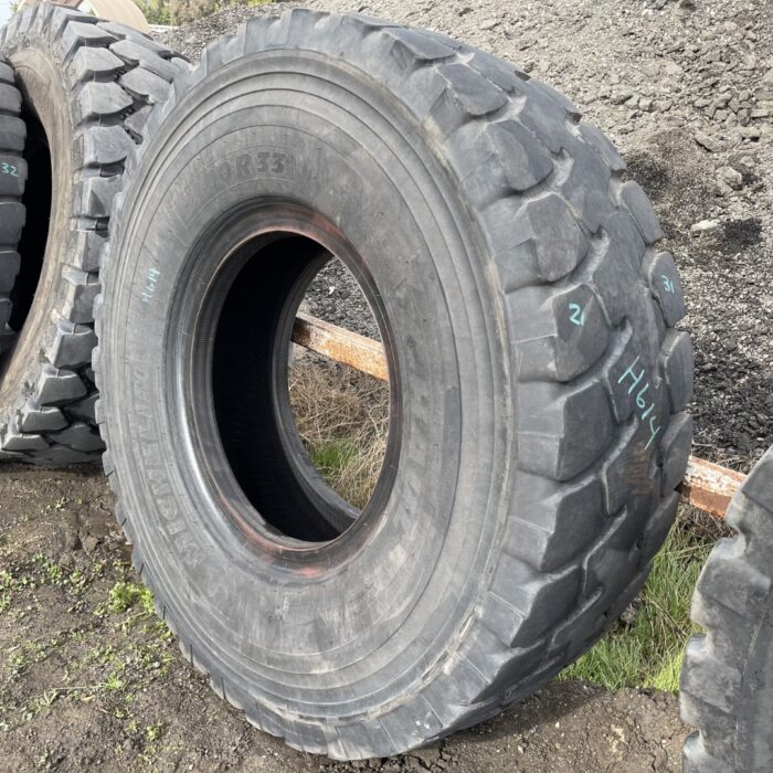 <font color='#da2127' font size ='2'><b>21.00R33 Michelin OTR Tire E-4 XHAUL 2-Star </font></b><br><font size ='1' color='grey'>CONDITION: </font><font size ='2'>Used<br><font size ='1' color='grey'>TREAD DEPTH:</font><font size ='2'>  26/32nds<br><font size ='1' color='grey'>DETAILS:</font><font size ='2'> Clean, Uneven Wear<br><font size ='1' color='grey'>REF #:</font><font size ='2'> H614<br><font size ='1' color='grey'>LOCATION:</font><font size ='2'> Amarillo, TX