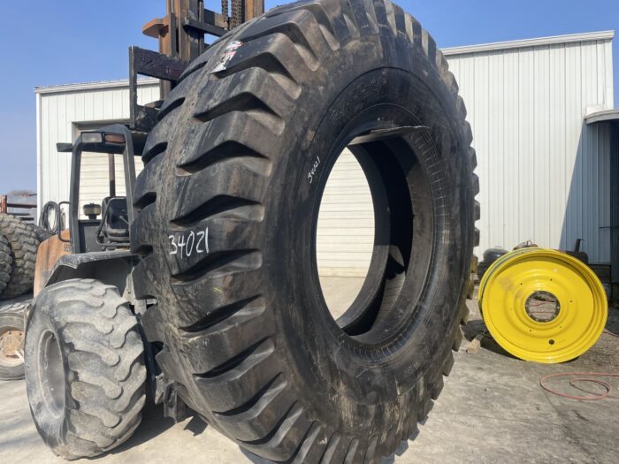 <font color='#da2127' font size ='2'><b>27.00X49 Advance OTR Tire E-4 Rock Deep Tread 48-Ply </font></b><br><font size ='1' color='grey'>CONDITION: </font><font size ='2'>New<br><font size ='1' color='grey'>TREAD DEPTH:</font><font size ='2'>  80/32nds<br><font size ='1' color='grey'>DETAILS:</font><font size ='2'> Unused<br><font size ='1' color='grey'>REF #:</font><font size ='2'> G34024<br><font size ='1' color='grey'>LOCATION:</font><font size ='2'> St. Louis, MO