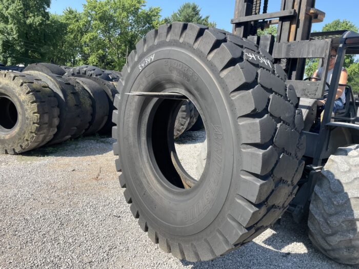 <font color='#da2127' font size ='2'><b>21.00R33 Bridgestone OTR Tire E-4 G-4 VMTS 2-Star </font></b><br><font size ='1' color='grey'>CONDITION: </font><font size ='2'>Used<br><font size ='1' color='grey'>TREAD DEPTH:</font><font size ='2'>  18/32nds<br><font size ='1' color='grey'>DETAILS:</font><font size ='2'> Clean, Lower Tread<br><font size ='1' color='grey'>REF #:</font><font size ='2'> G34344<br><font size ='1' color='grey'>LOCATION:</font><font size ='2'> St. Louis, MO