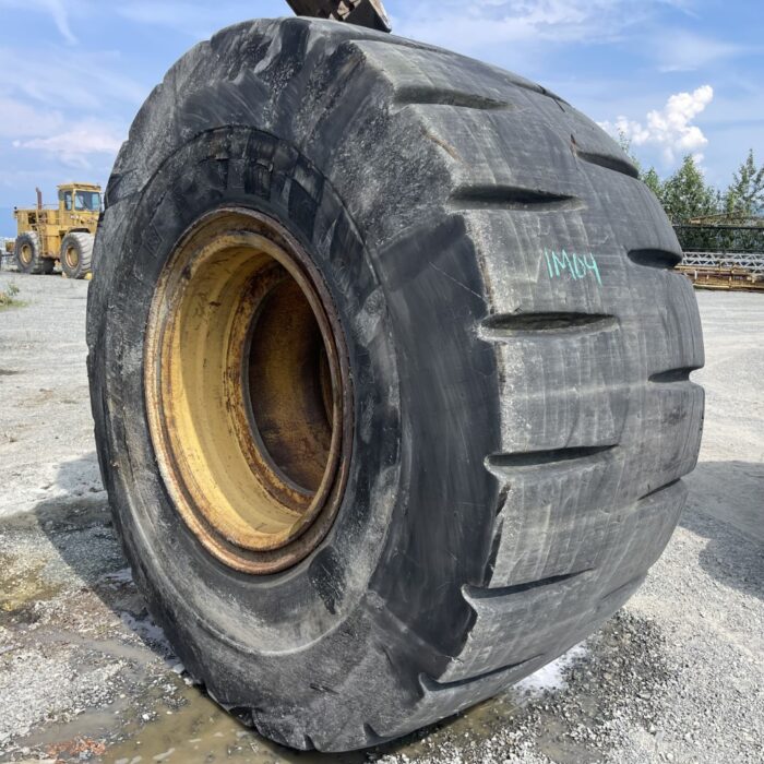 <font color='#da2127' font size ='2'><b>40/65X39 Bridgestone OTR Tire L-5 Dlug 36-Ply </font></b><br><font size ='1' color='grey'>CONDITION: </font><font size ='2'>Retread-Used<br><font size ='1' color='grey'>TREAD DEPTH:</font><font size ='2'>  75/32nds<br><font size ='1' color='grey'>DETAILS:</font><font size ='2'> Clean, On Rim<br><font size ='1' color='grey'>REF #:</font><font size ='2'> IM04<br><font size ='1' color='grey'>LOCATION:</font><font size ='2'> Jamestown, CA