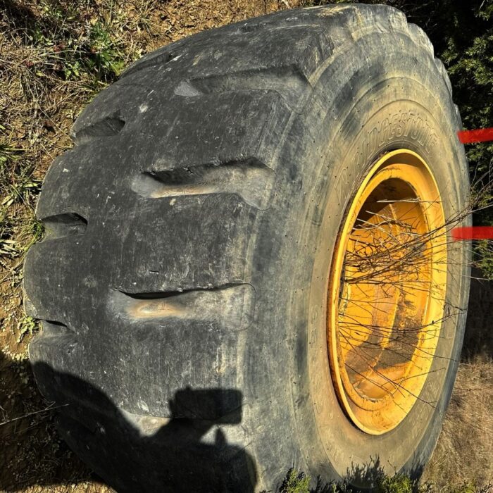 <font color='#da2127' font size ='2'><b>35/65R33 Bridgestone OTR Tire L-5 VSDL 1-Star </font></b><br><font size ='1' color='grey'>CONDITION: </font><font size ='2'>Used<br><font size ='1' color='grey'>TREAD DEPTH:</font><font size ='2'>  80/32nds<br><font size ='1' color='grey'>DETAILS:</font><font size ='2'> Clean, On Rim<br><font size ='1' color='grey'>REF #:</font><font size ='2'> C991<br><font size ='1' color='grey'>LOCATION:</font><font size ='2'> Sherman, TX