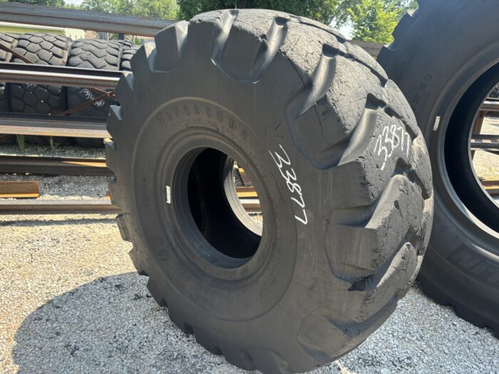 <font color='#da2127' font size ='2'><b>29.5X25 Firestone OTR Tire E-3 L-3 SRG Super Rock Grip 28-Ply </font></b><br><font size ='1' color='grey'>CONDITION: </font><font size ='2'>Used <br><font size ='1' color='grey'>TREAD DEPTH:</font><font size ='2'>  38/32nds<br><font size ='1' color='grey'>DETAILS:</font><font size ='2'> 1-Tread Section<br><font size ='1' color='grey'>REF #:</font><font size ='2'> G33877<br><font size ='1' color='grey'>LOCATION:</font><font size ='2'> St. Louis, MO
