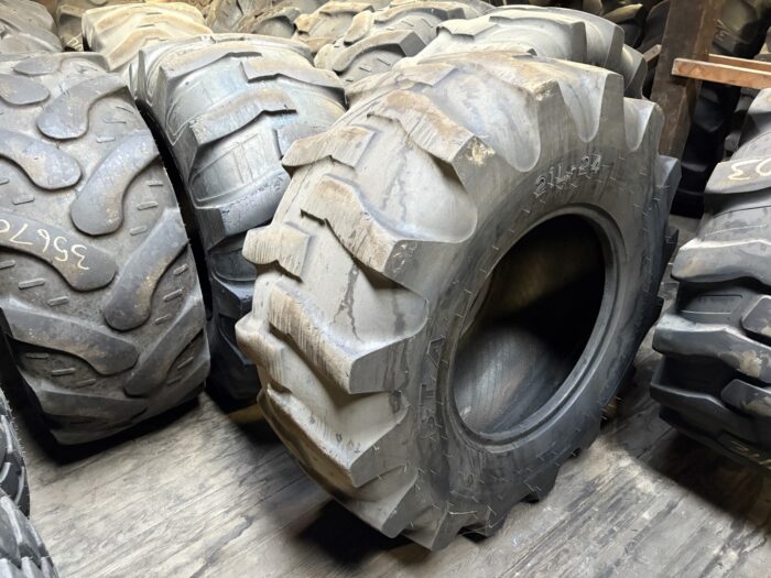 <font color='#da2127' font size ='2'><b>21LX24 STA OTR Tire E-2 L-2 G-2 R-4 American Contractor 12-Ply </font></b><br><font size ='1' color='grey'>CONDITION: </font><font size ='2'>Used <br><font size ='1' color='grey'>TREAD DEPTH:</font><font size ='2'>  16/32nds<br><font size ='1' color='grey'>DETAILS:</font><font size ='2'> Clean<br><font size ='1' color='grey'>REF #:</font><font size ='2'> G33964<br><font size ='1' color='grey'>LOCATION:</font><font size ='2'> St. Louis, MO