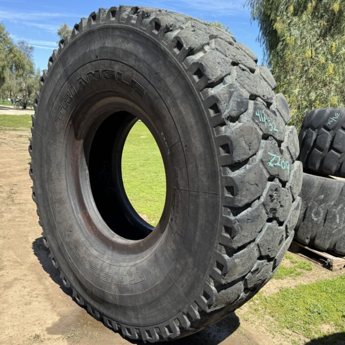 <font color='#da2127' font size ='2'><b>24.00R35 Triangle OTR Tire E-4 TB526S 2-Star </font></b><br><font size ='1' color='grey'>CONDITION: </font><font size ='2'>Used<br><font size ='1' color='grey'>TREAD DEPTH:</font><font size ='2'>  41/32nds<br><font size ='1' color='grey'>DETAILS:</font><font size ='2'> Clean, Rough Tread on One Shoulder<br><font size ='1' color='grey'>REF #:</font><font size ='2'> Z209<br><font size ='1' color='grey'>LOCATION:</font><font size ='2'> San Jacinto, CA
