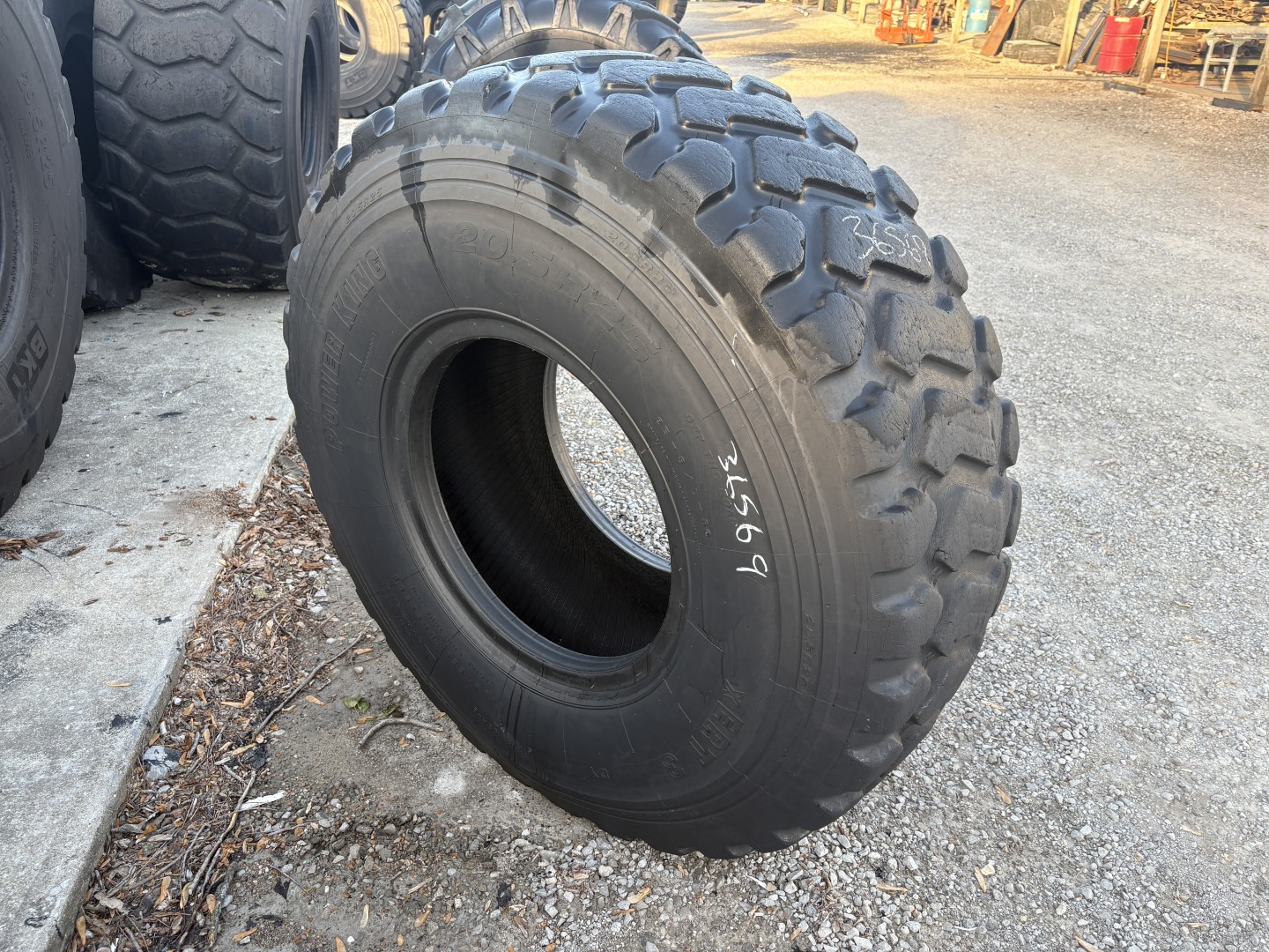 <font color='#da2127' font size ='2'><b>20.5R25 Power King OTR Tire E-3 L-3 XERT-3 2-Star </font></b><br><font size ='1' color='grey'>CONDITION: </font><font size ='2'>Used<br><font size ='1' color='grey'>TREAD DEPTH:</font><font size ='2'> 22/32nds<br><font size ='1' color='grey'>DETAILS:</font><font size ='2'> 1-Shoulder Section<br><font size ='1' color='grey'>REF #:</font><font size ='2'> G36569<br><font size ='1' color='grey'>LOCATION:</font><font size ='2'> St. Louis, MO