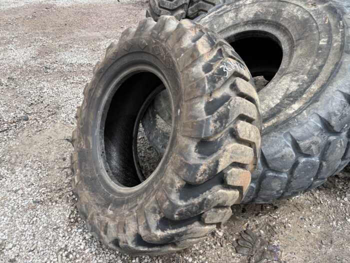 <font color='#da2127' font size ='2'><b>17.5X25 Goodyear OTR Tire E-2 L-2 G-2 SGL Sure Grip Lug 12-Ply </font></b><br><font size ='1' color='grey'>CONDITION: </font><font size ='2'>New<br><font size ='1' color='grey'>TREAD DEPTH:</font><font size ='2'>  32/32nds<br><font size ='1' color='grey'>DETAILS:</font><font size ='2'> Unused<br><font size ='1' color='grey'>REF #:</font><font size ='2'> G36841<br><font size ='1' color='grey'>LOCATION:</font><font size ='2'> St. Louis, MO