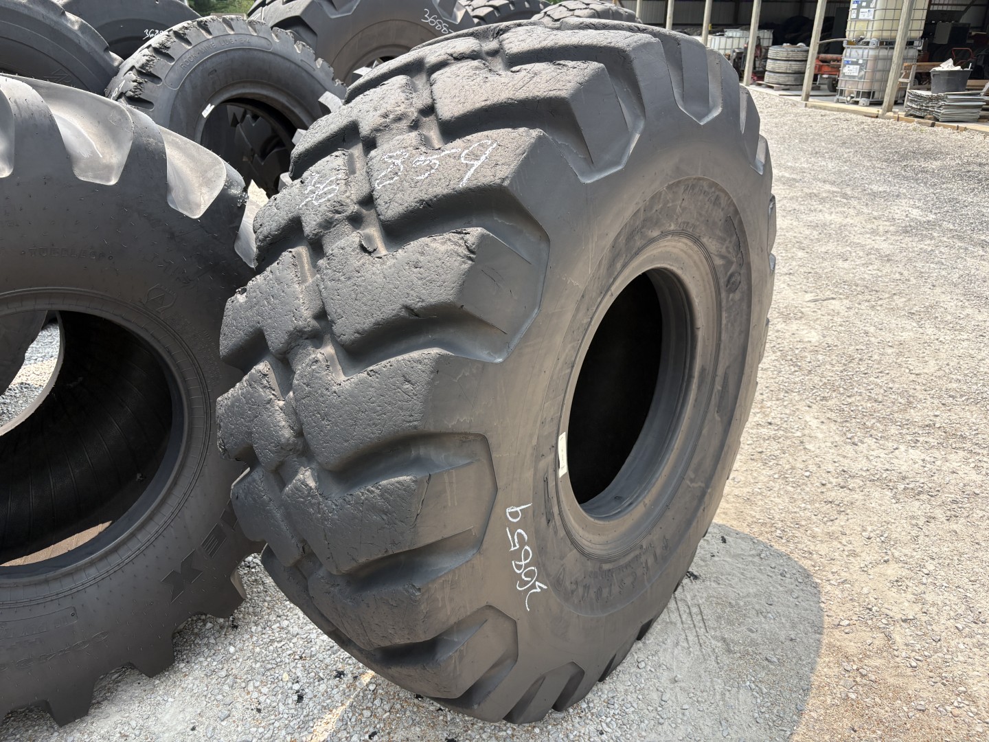 <font color='#da2127' font size ='2'><b>26.5X25 Firestone OTR Tire E-2 L-2 G-2 SGG Super Ground Grip 20-Ply </font></b><br><font size ='1' color='grey'>CONDITION: </font><font size ='2'>Used<br><font size ='1' color='grey'>TREAD DEPTH:</font><font size ='2'> 37/32nds<br><font size ='1' color='grey'>DETAILS:</font><font size ='2'> Clean<br><font size ='1' color='grey'>REF #:</font><font size ='2'> G36859<br><font size ='1' color='grey'>LOCATION:</font><font size ='2'> St. Louis, MO