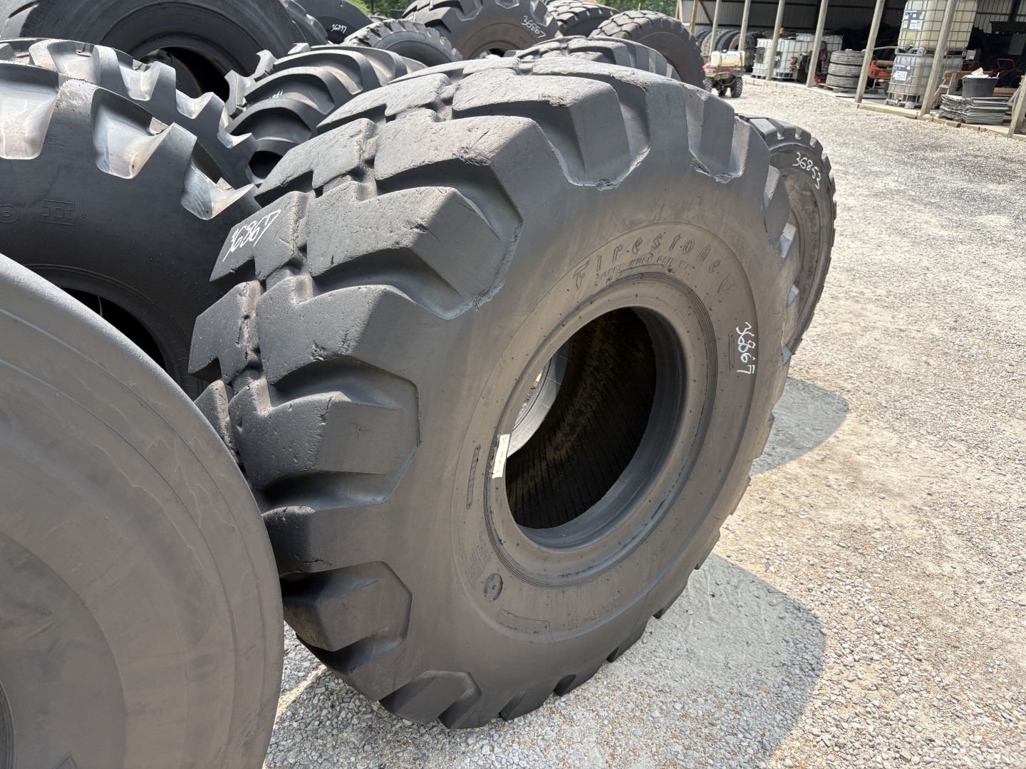 <font color='#da2127' font size ='2'><b>26.5X25 Firestone OTR Tire E-3 L-3 SRG Super Rock Grip 20-Ply </font></b><br><font size ='1' color='grey'>CONDITION: </font><font size ='2'>Used<br><font size ='1' color='grey'>TREAD DEPTH:</font><font size ='2'> 36/32nds<br><font size ='1' color='grey'>DETAILS:</font><font size ='2'> Clean<br><font size ='1' color='grey'>REF #:</font><font size ='2'> G36867<br><font size ='1' color='grey'>LOCATION:</font><font size ='2'> St. Louis, MO