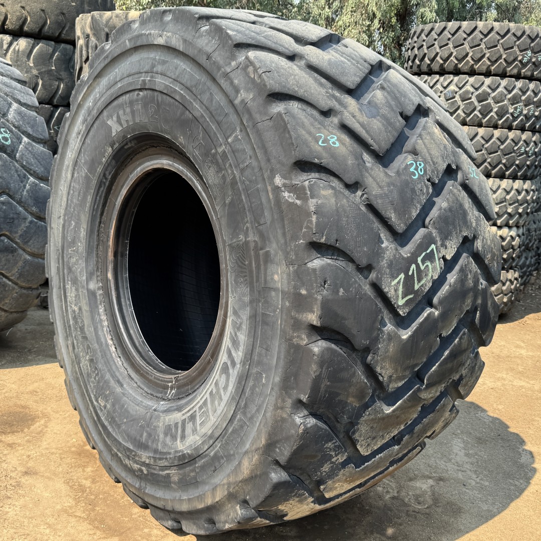 <font color='#da2127' font size ='2'><b>875/65R29 Michelin OTR Tire E-3 L-3 XHA2 1-Star </font></b><br><font size ='1' color='grey'>CONDITION: </font><font size ='2'>Used<br><font size ='1' color='grey'>TREAD DEPTH:</font><font size ='2'> 32/32nds<br><font size ='1' color='grey'>DETAILS:</font><font size ='2'> Clean, Shoulder Cracks, 1-Tread Patch<br><font size ='1' color='grey'>REF #:</font><font size ='2'> Z257<br><font size ='1' color='grey'>LOCATION:</font><font size ='2'> San Jacinto, CA