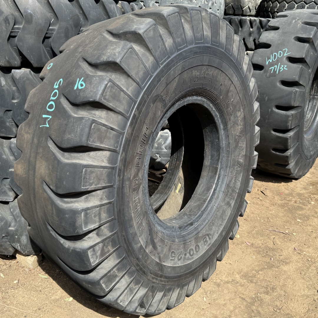 <font color='#da2127' font size ='2'><b>18.00X25 Alliance OTR Tire E-3 L-3 Super Grip 40-Ply </font></b><br><font size ='1' color='grey'>CONDITION: </font><font size ='2'>Used<br><font size ='1' color='grey'>TREAD DEPTH:</font><font size ='2'> 8/32nds<br><font size ='1' color='grey'>DETAILS:</font><font size ='2'> Clean, Uneven Wear<br><font size ='1' color='grey'>REF #:</font><font size ='2'> W005<br><font size ='1' color='grey'>LOCATION:</font><font size ='2'> San Jacinto, CA