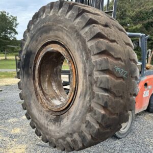 <font color='#da2127' font size ='2'><b>24.00X35 Titan OTR Tire E-4 CM150 CM 150 48-Ply </font></b><br><font size ='1' color='grey'>CONDITION: </font><font size ='2'>Used<br><font size ='1' color='grey'>TREAD DEPTH:</font><font size ='2'>  36/32nds<br><font size ='1' color='grey'>DETAILS:</font><font size ='2'> Clean, Minor Burn Marks on One Side, On Rim<br><font size ='1' color='grey'>REF #:</font><font size ='2'> Z266<br><font size ='1' color='grey'>LOCATION:</font><font size ='2'> Ashville, AL