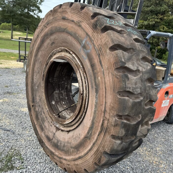 <font color='#da2127' font size ='2'><b>24.00X35 Titan OTR Tire E-4 CM150 CM 150 48-Ply </font></b><br><font size ='1' color='grey'>CONDITION: </font><font size ='2'>Retread-Used<br><font size ='1' color='grey'>TREAD DEPTH:</font><font size ='2'>  64/32nds<br><font size ='1' color='grey'>DETAILS:</font><font size ='2'> Clean, On Rim<br><font size ='1' color='grey'>REF #:</font><font size ='2'> Z268<br><font size ='1' color='grey'>LOCATION:</font><font size ='2'> Ashville, AL