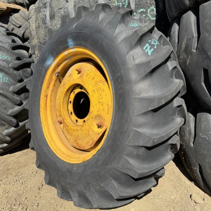 <font color='#da2127' font size ='2'><b>14.9X28 Del-Nat OTR Tire R-1 Hi Traction Lug 4-Ply </font></b><br><font size ='1' color='grey'>CONDITION: </font><font size ='2'>Used<br><font size ='1' color='grey'>TREAD DEPTH:</font><font size ='2'>  40/32nds<br><font size ='1' color='grey'>DETAILS:</font><font size ='2'> Clean, Aged, On Rim, Sat Flat<br><font size ='1' color='grey'>REF #:</font><font size ='2'> Z301<br><font size ='1' color='grey'>LOCATION:</font><font size ='2'> San Jacinto, CA