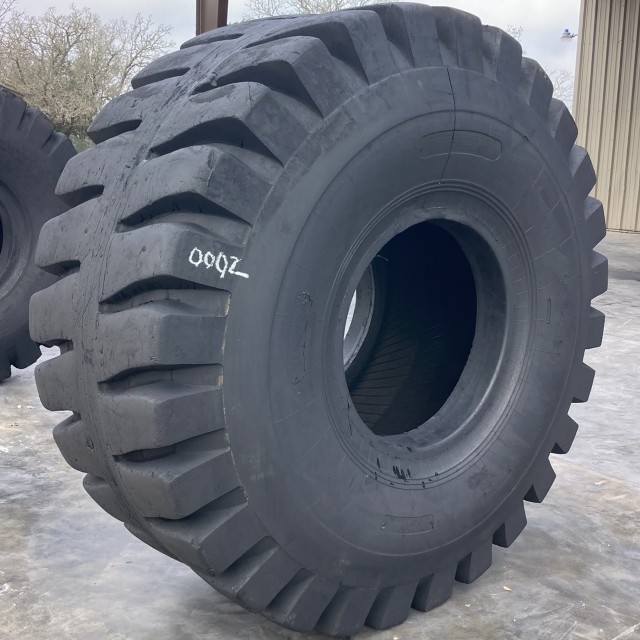 <font color='#da2127' font size ='2'><b>33.25X29 Heavy Duty OTR Tire E-3 L-3 E3/L3 38-Ply </font></b><br><font size ='1' color='grey'>CONDITION: </font><font size ='2'>Used<br><font size ='1' color='grey'>TREAD DEPTH:</font><font size ='2'> 55/32nds<br><font size ='1' color='grey'>DETAILS:</font><font size ='2'> Clean, Minor Crowning<br><font size ='1' color='grey'>REF #:</font><font size ='2'> D502<br><font size ='1' color='grey'>LOCATION:</font><font size ='2'> Amarillo, TX