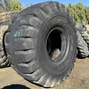 <font color='#da2127' font size ='2'><b>33.25X29 Titan OTR Tire E-3 SL100 38-Ply </font></b><br><font size ='1' color='grey'>CONDITION: </font><font size ='2'>Used<br><font size ='1' color='grey'>TREAD DEPTH:</font><font size ='2'>  15/32nds<br><font size ='1' color='grey'>DETAILS:</font><font size ='2'> Clean, Weathered Tread, Shoulder Cracks<br><font size ='1' color='grey'>REF #:</font><font size ='2'> W187<br><font size ='1' color='grey'>LOCATION:</font><font size ='2'> San Jacinto, CA