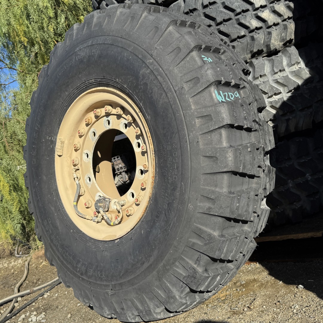 <font color='#da2127' font size ='2'><b>14.00X20 General OTR Tire M-3 E-2 Military M-Multipurpose 18-Ply </font></b><br><font size ='1' color='grey'>CONDITION: </font><font size ='2'>New-Take-Off<br><font size ='1' color='grey'>TREAD DEPTH:</font><font size ='2'> 31/32nds<br><font size ='1' color='grey'>DETAILS:</font><font size ='2'> Clean, On Rim<br><font size ='1' color='grey'>REF #:</font><font size ='2'> W209<br><font size ='1' color='grey'>LOCATION:</font><font size ='2'> San Jacinto, CA