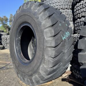 <font color='#da2127' font size ='2'><b>29.5X35 Firestone OTR Tire E-3 L-3 SRG Super Rock Grip 34-Ply </font></b><br><font size ='1' color='grey'>CONDITION: </font><font size ='2'>Used<br><font size ='1' color='grey'>TREAD DEPTH:</font><font size ='2'>  13/32nds<br><font size ='1' color='grey'>DETAILS:</font><font size ='2'> Clean, Low Rubber<br><font size ='1' color='grey'>REF #:</font><font size ='2'> W180<br><font size ='1' color='grey'>LOCATION:</font><font size ='2'> San Jacinto, CA