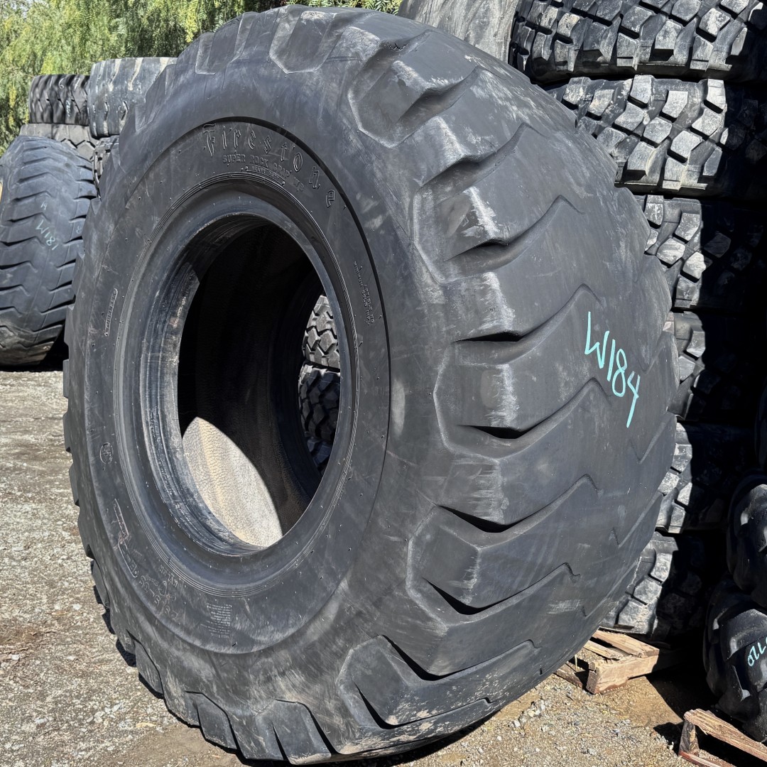 <font color='#da2127' font size ='2'><b>29.5X35 Firestone OTR Tire E-3 L-3 SRG Super Rock Grip 34-Ply </font></b><br><font size ='1' color='grey'>CONDITION: </font><font size ='2'>Used<br><font size ='1' color='grey'>TREAD DEPTH:</font><font size ='2'> 6/32nds<br><font size ='1' color='grey'>DETAILS:</font><font size ='2'> Clean, Low Rubber<br><font size ='1' color='grey'>REF #:</font><font size ='2'> W184<br><font size ='1' color='grey'>LOCATION:</font><font size ='2'> San Jacinto, CA