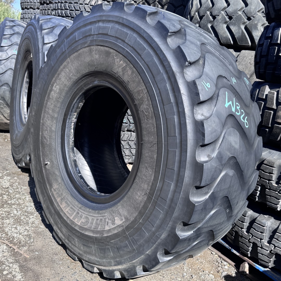 <font color='#da2127' font size ='2'><b>23.5R25 Michelin OTR Tire E-3 L-3 XHA2 2-Star </font></b><br><font size ='1' color='grey'>CONDITION: </font><font size ='2'>Used<br><font size ='1' color='grey'>TREAD DEPTH:</font><font size ='2'> 14/32nds<br><font size ='1' color='grey'>DETAILS:</font><font size ='2'> Clean, Mildly Aged Tread<br><font size ='1' color='grey'>REF #:</font><font size ='2'> W326<br><font size ='1' color='grey'>LOCATION:</font><font size ='2'> San Jacinto, CA
