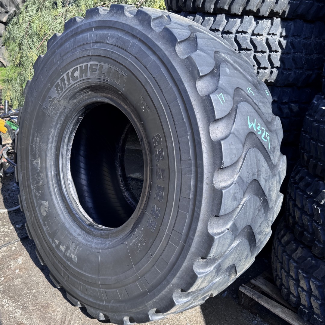 <font color='#da2127' font size ='2'><b>23.5R25 Michelin OTR Tire E-3 L-3 XHA2 2-Star </font></b><br><font size ='1' color='grey'>CONDITION: </font><font size ='2'>Used<br><font size ='1' color='grey'>TREAD DEPTH:</font><font size ='2'> 14/32nds<br><font size ='1' color='grey'>DETAILS:</font><font size ='2'> Clean, Mildly Aged Tread<br><font size ='1' color='grey'>REF #:</font><font size ='2'> W329<br><font size ='1' color='grey'>LOCATION:</font><font size ='2'> San Jacinto, CA
