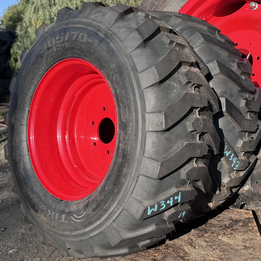 <font color='#da2127' font size ='2'><b>305/70X16.5 Tiron OTR Tire R-4 Industrial Lug HS610 4-Ply </font></b><br><font size ='1' color='grey'>CONDITION: </font><font size ='2'>New<br><font size ='1' color='grey'>TREAD DEPTH:</font><font size ='2'> 19/32nds<br><font size ='1' color='grey'>DETAILS:</font><font size ='2'> Unused, 12X16.5 Tire, On Rim 9.75X16.5<br><font size ='1' color='grey'>REF #:</font><font size ='2'> W343<br><font size ='1' color='grey'>LOCATION:</font><font size ='2'> San Jacinto, CA