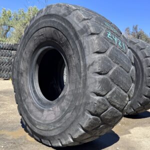 <font color='#da2127' font size ='2'><b>26.5R25 Bridgestone OTR Tire E-3 L-3 VMT 1-Star </font></b><br><font size ='1' color='grey'>CONDITION: </font><font size ='2'>Used<br><font size ='1' color='grey'>TREAD DEPTH:</font><font size ='2'>  12/32nds<br><font size ='1' color='grey'>DETAILS:</font><font size ='2'> Clean, Weathered Tread, Shoulder Cracks on One Side<br><font size ='1' color='grey'>REF #:</font><font size ='2'> Z421<br><font size ='1' color='grey'>LOCATION:</font><font size ='2'> San Jacinto, CA