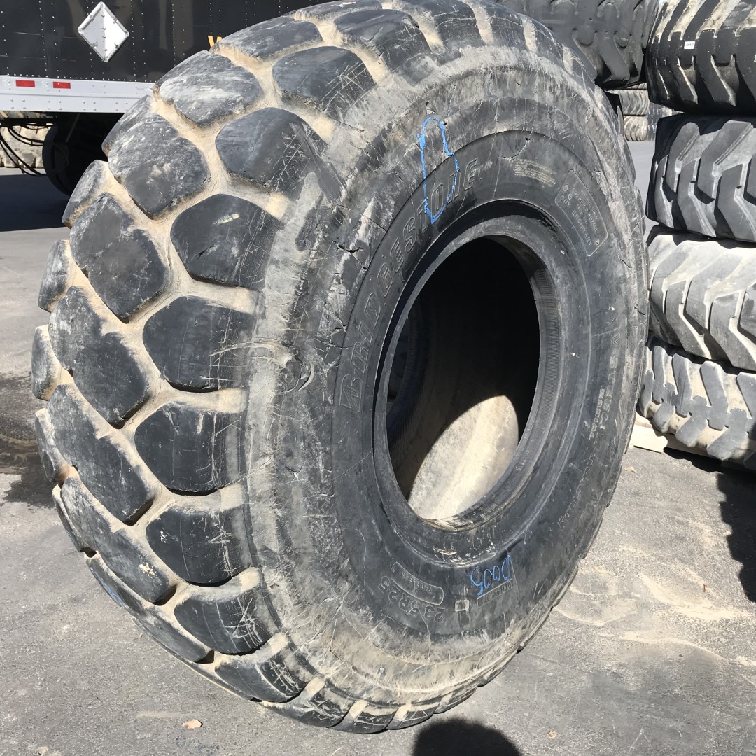 <font color='#da2127' font size ='2'><b>23.5R25 Bridgestone OTR Tire E-3 L-3 VMT 1-Star </font></b><br><font size ='1' color='grey'>CONDITION: </font><font size ='2'>Used<br><font size ='1' color='grey'>TREAD DEPTH:</font><font size ='2'> 28/32nds<br><font size ='1' color='grey'>DETAILS:</font><font size ='2'> 1-Patch, Sidewall Crack<br><font size ='1' color='grey'>REF #:</font><font size ='2'> D005<br><font size ='1' color='grey'>LOCATION:</font><font size ='2'> Riverside, CA