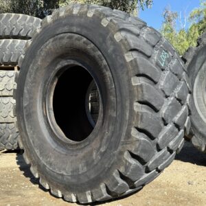 <font color='#da2127' font size ='2'><b>875/65R29 Bridgestone OTR Tire E-3 L-3 VTSZ 2-Star </font></b><br><font size ='1' color='grey'>CONDITION: </font><font size ='2'>Used<br><font size ='1' color='grey'>TREAD DEPTH:</font><font size ='2'>  34/32nds<br><font size ='1' color='grey'>DETAILS:</font><font size ='2'> Clean, 1-Shoulder Crack, Weathered Tread<br><font size ='1' color='grey'>REF #:</font><font size ='2'> L003<br><font size ='1' color='grey'>LOCATION:</font><font size ='2'> San Jacinto, CA