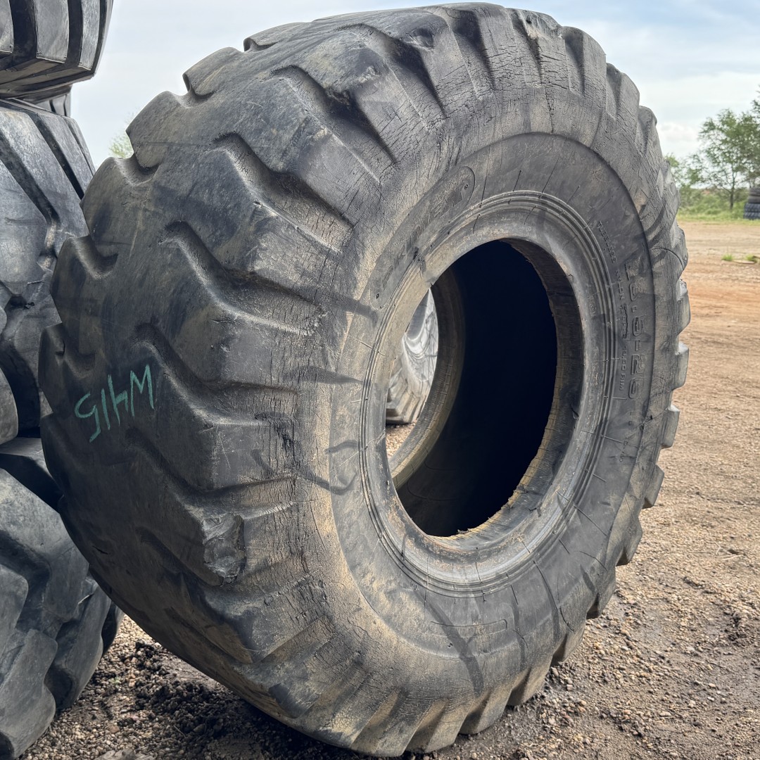<font color='#da2127' font size ='2'><b>23.5X25 Prime-X OTR Tire E-3 L-3 Mega Rock 300 20-Ply </font></b><br><font size ='1' color='grey'>CONDITION: </font><font size ='2'>Used<br><font size ='1' color='grey'>TREAD DEPTH:</font><font size ='2'> 15/32nds<br><font size ='1' color='grey'>DETAILS:</font><font size ='2'> Clean, Aged, Ran Low Cracks<br><font size ='1' color='grey'>REF #:</font><font size ='2'> W415<br><font size ='1' color='grey'>LOCATION:</font><font size ='2'> Amarillo, TX