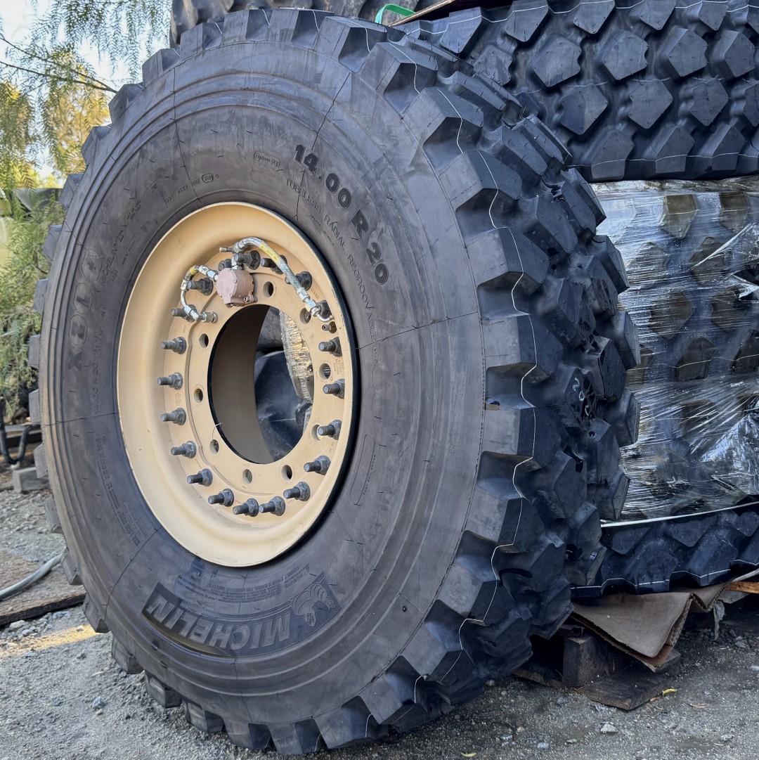 <font color='#da2127' font size ='2'><b>14.00R20 Michelin OTR Tire M-3 Off-Road XML Military 22-Ply </font></b><br><font size ='1' color='grey'>CONDITION: </font><font size ='2'>New<br><font size ='1' color='grey'>TREAD DEPTH:</font><font size ='2'> 29/32nds<br><font size ='1' color='grey'>DETAILS:</font><font size ='2'> Clean, On Rim, 2021<br><font size ='1' color='grey'>REF #:</font><font size ='2'> W445<br><font size ='1' color='grey'>LOCATION:</font><font size ='2'> San Jacinto, CA