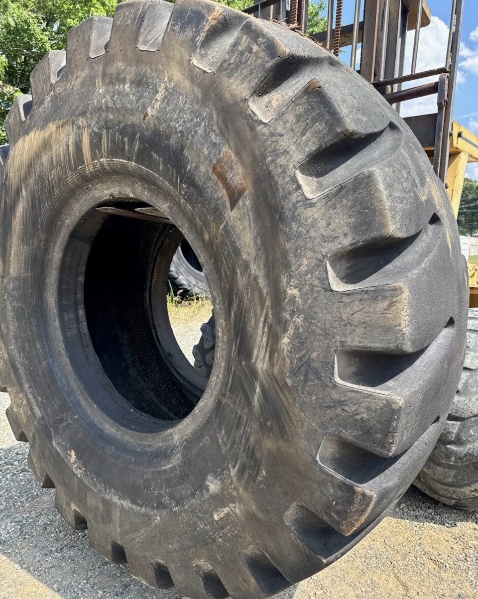 <font color='#da2127' font size ='2'><b>33.25X35 Titan OTR Tire E-4 CM150 CM 150 38-Ply </font></b><br><font size ='1' color='grey'>CONDITION: </font><font size ='2'>Used<br><font size ='1' color='grey'>TREAD DEPTH:</font><font size ='2'> 50/32nds<br><font size ='1' color='grey'>DETAILS:</font><font size ='2'> Clean<br><font size ='1' color='grey'>REF #:</font><font size ='2'> Z469<br><font size ='1' color='grey'>LOCATION:</font><font size ='2'> Kernersville, NC