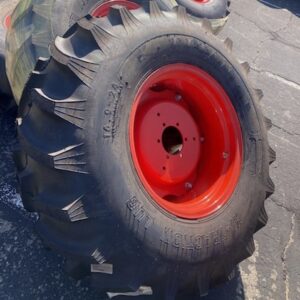 <font color='#da2127' font size ='2'><b>16.9X24 Titan OTR Tire R-1 Hi Traction Lug 6-Ply </font></b><br><font size ='1' color='grey'>CONDITION: </font><font size ='2'>New<br><font size ='1' color='grey'>TREAD DEPTH:</font><font size ='2'>  48/32nds<br><font size ='1' color='grey'>DETAILS:</font><font size ='2'> Unused, On Kioti Rims<br><font size ='1' color='grey'>REF #:</font><font size ='2'> W573<br><font size ='1' color='grey'>LOCATION:</font><font size ='2'> Tucson, AZ