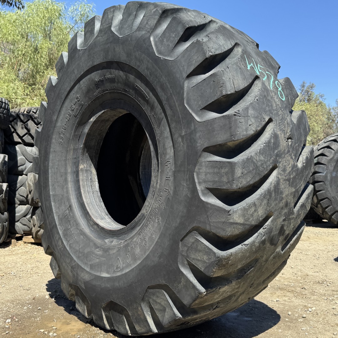 <font color='#da2127' font size ='2'><b>33.25X29 Firestone OTR Tire E-4 SRG DT Super Rock Grip Deep Tread 32-Ply </font></b><br><font size ='1' color='grey'>CONDITION: </font><font size ='2'>Used<br><font size ='1' color='grey'>TREAD DEPTH:</font><font size ='2'> 36/32nds<br><font size ='1' color='grey'>DETAILS:</font><font size ='2'> Clean, Minor Rock Cuts in Tread<br><font size ='1' color='grey'>REF #:</font><font size ='2'> W578<br><font size ='1' color='grey'>LOCATION:</font><font size ='2'> San Jacinto, CA