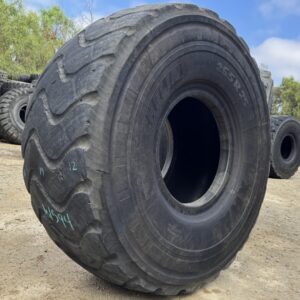 <font color='#da2127' font size ='2'><b>26.5R25 Michelin OTR Tire E-3 L-3 XHA2 2-Star </font></b><br><font size ='1' color='grey'>CONDITION: </font><font size ='2'>Used<br><font size ='1' color='grey'>TREAD DEPTH:</font><font size ='2'>  15/32nds<br><font size ='1' color='grey'>DETAILS:</font><font size ='2'> Clean, Minor Rock Cuts on One Sidewall<br><font size ='1' color='grey'>REF #:</font><font size ='2'> W594<br><font size ='1' color='grey'>LOCATION:</font><font size ='2'> San Jacinto, CA