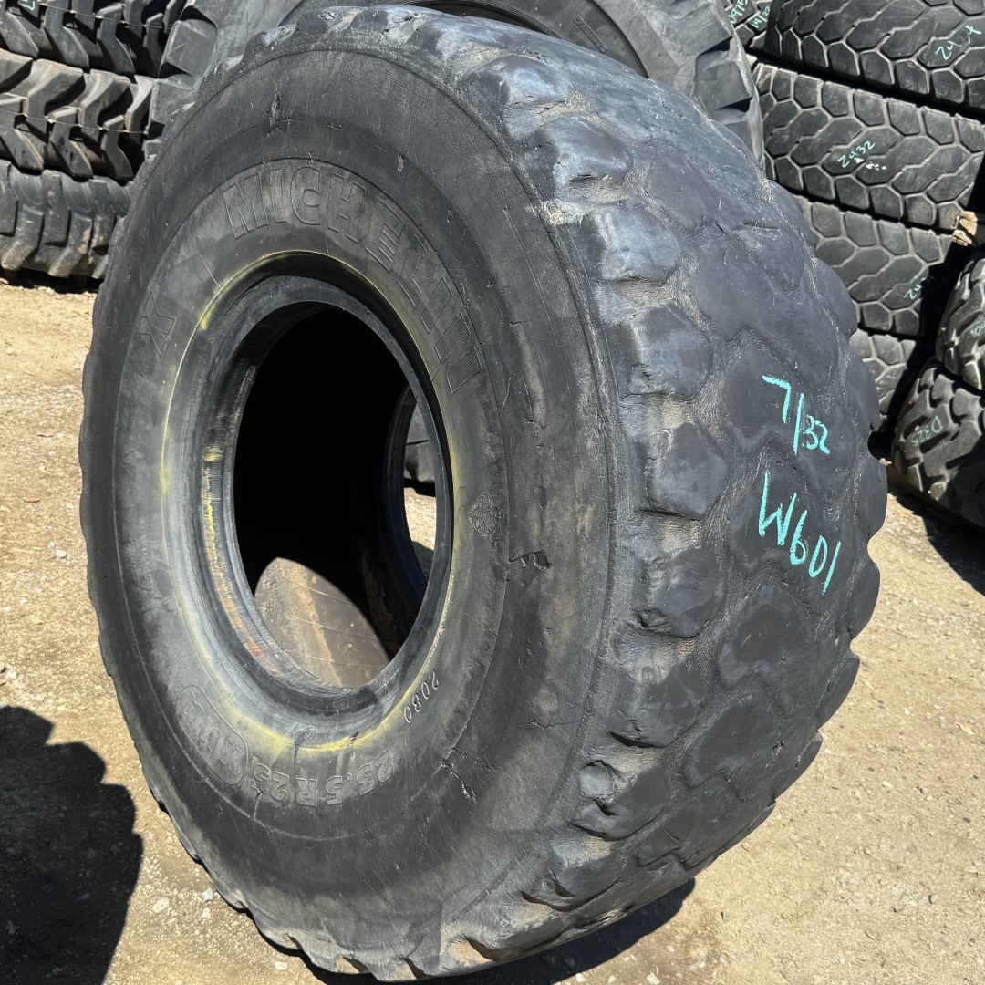 <font color='#da2127' font size ='2'><b>23.5R25 Michelin OTR Tire E-3 L-3 XHA 1-Star </font></b><br><font size ='1' color='grey'>CONDITION: </font><font size ='2'>Used<br><font size ='1' color='grey'>TREAD DEPTH:</font><font size ='2'> 7/32nds<br><font size ='1' color='grey'>DETAILS:</font><font size ='2'> Clean, Low Tread, Aged, Sidewall Rock Cuts<br><font size ='1' color='grey'>REF #:</font><font size ='2'> W601<br><font size ='1' color='grey'>LOCATION:</font><font size ='2'> San Jacinto, CA