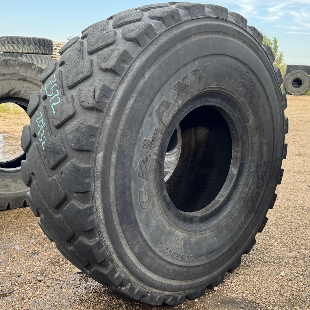 <font color='#da2127' font size ='2'><b>26.5R25 Galaxy OTR Tire E-3 L-3 LDSR 300 2-Star </font></b><br><font size ='1' color='grey'>CONDITION: </font><font size ='2'>Used<br><font size ='1' color='grey'>TREAD DEPTH:</font><font size ='2'> 20/32nds<br><font size ='1' color='grey'>DETAILS:</font><font size ='2'> Clean<br><font size ='1' color='grey'>REF #:</font><font size ='2'> Z572<br><font size ='1' color='grey'>LOCATION:</font><font size ='2'> Amarillo, TX